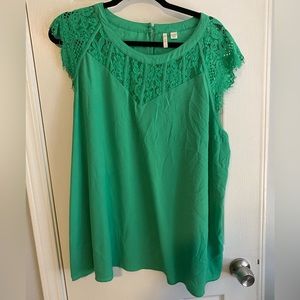 Green blouse with lace accent